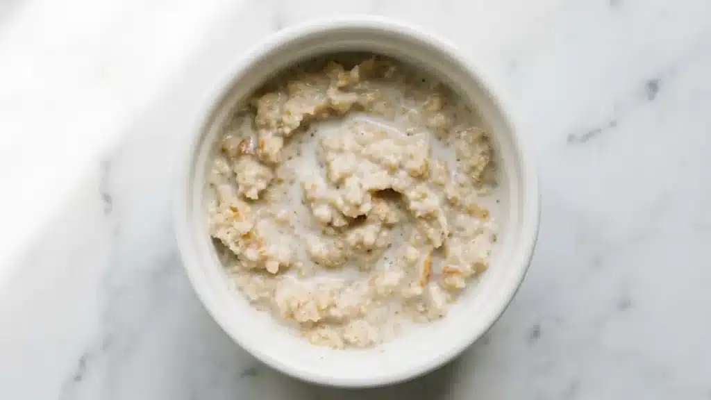 Breadcrumbs soaking in milk to make panade for classic meatloaf recipe